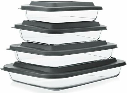 Stacked glass baking dishes with gray lids.